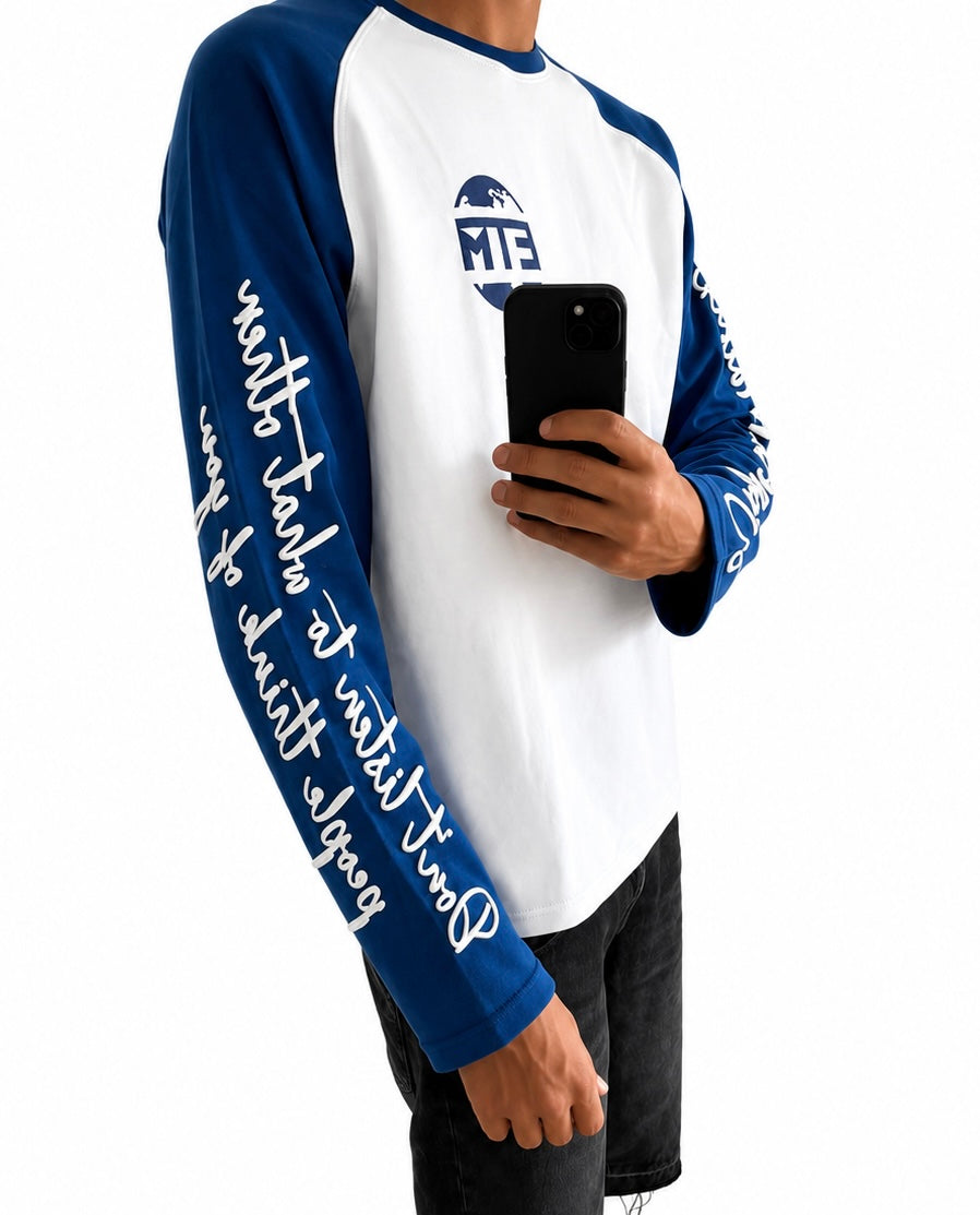 Dark blue and white long sleeve with writing