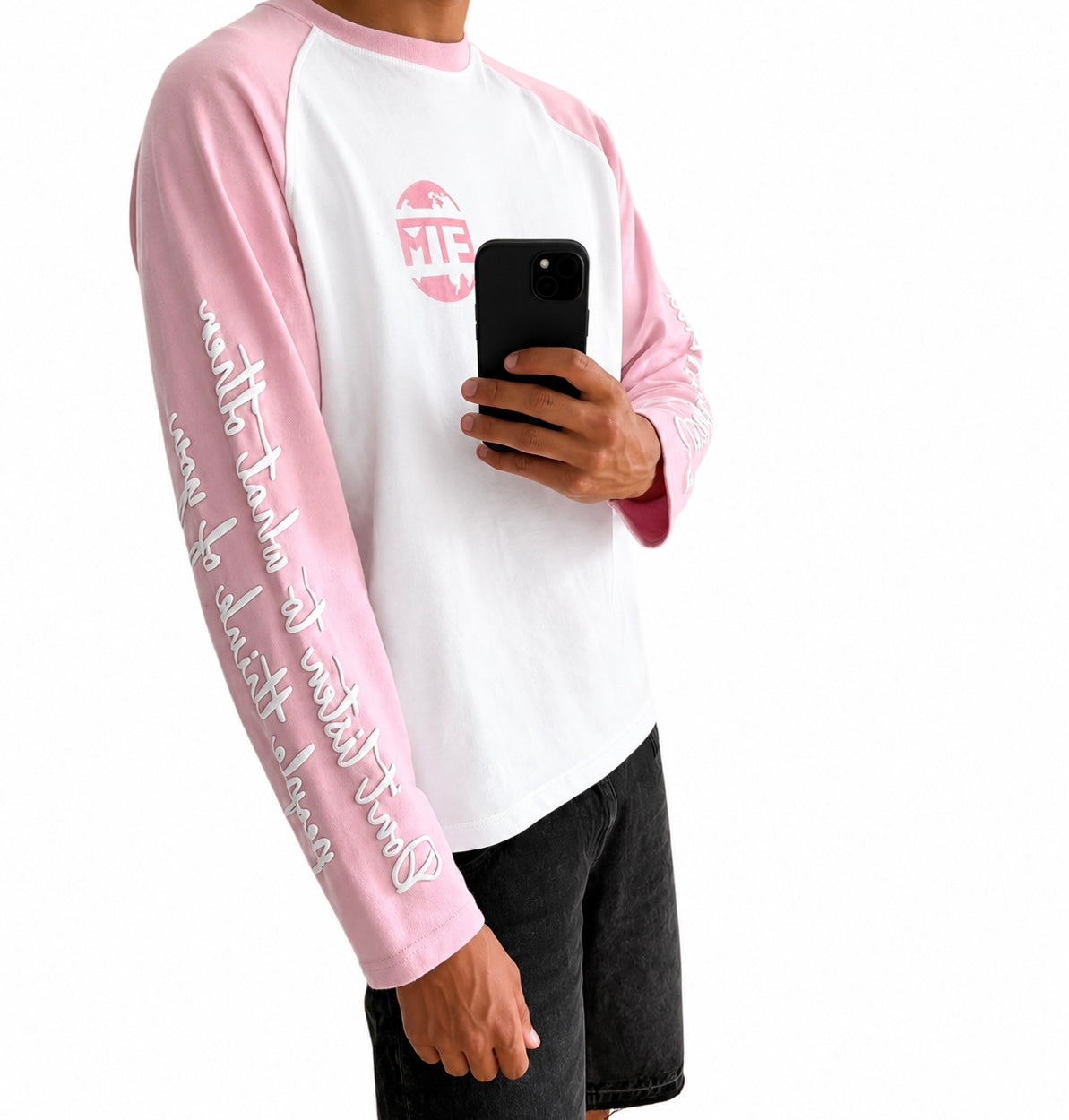 Pink and white long sleeve with writing