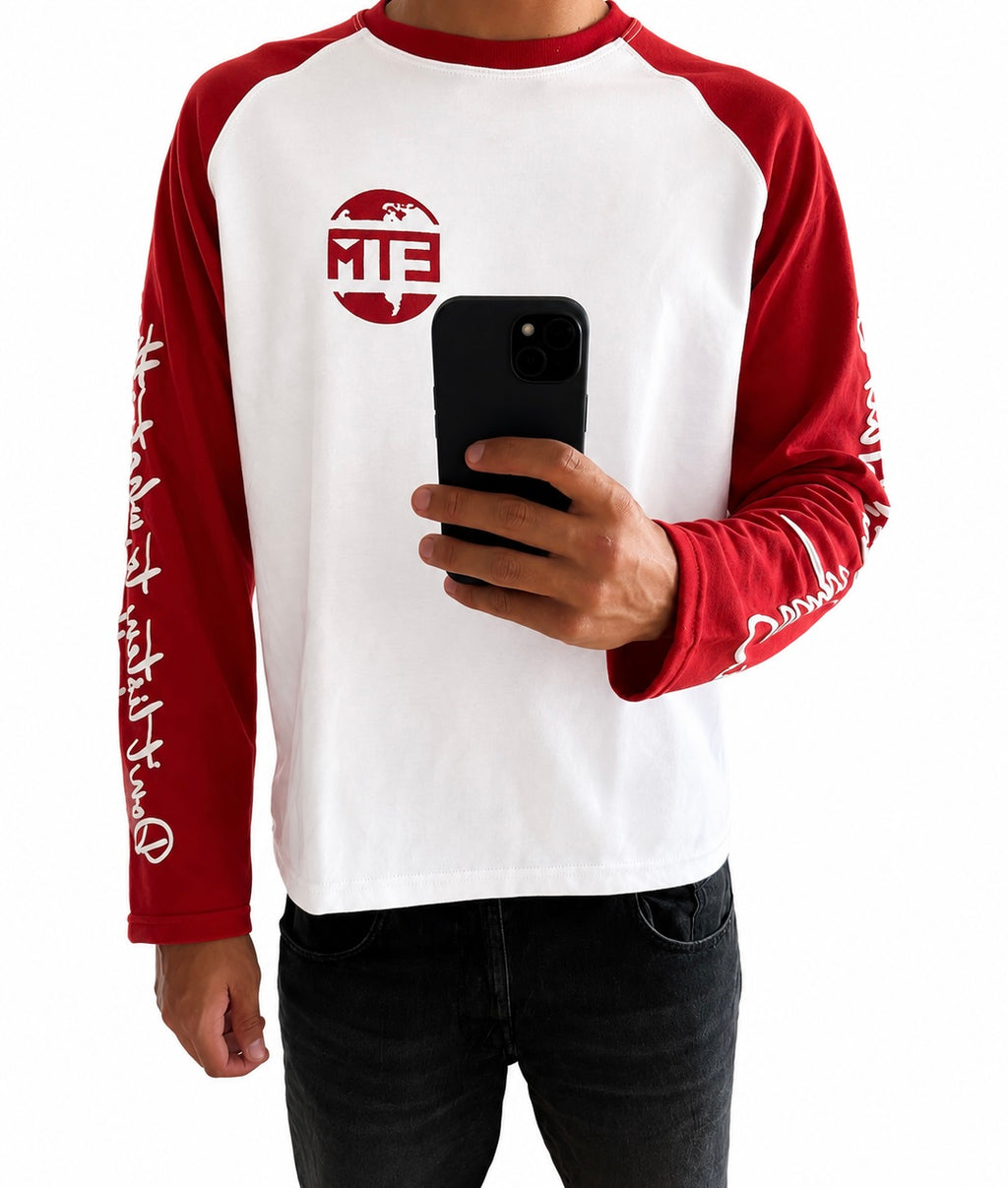 Red and white long sleeve with writing